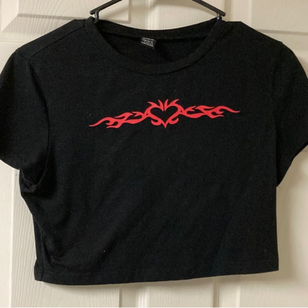 black crop top from SHEIN size large on the front has heart flame